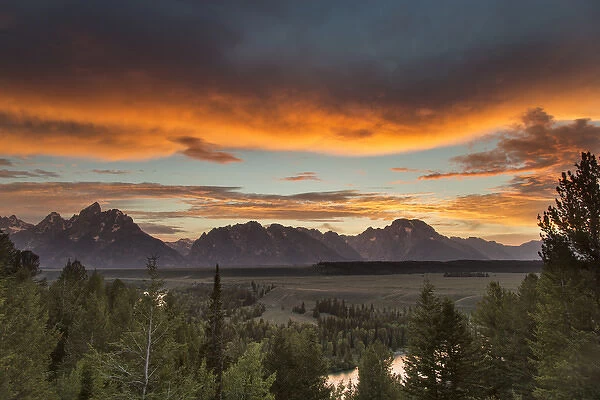 Vivid sunset clouds over the Snake River in Grand Teton National Park, Wyoming, USA