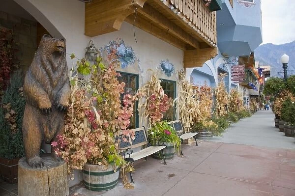 WA, Leavenworth, Bavarian style village, shop fronts decorated for autumn