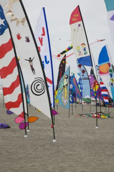 Framed Print : WA, Long Beach, International Kite Festival, colorful banners