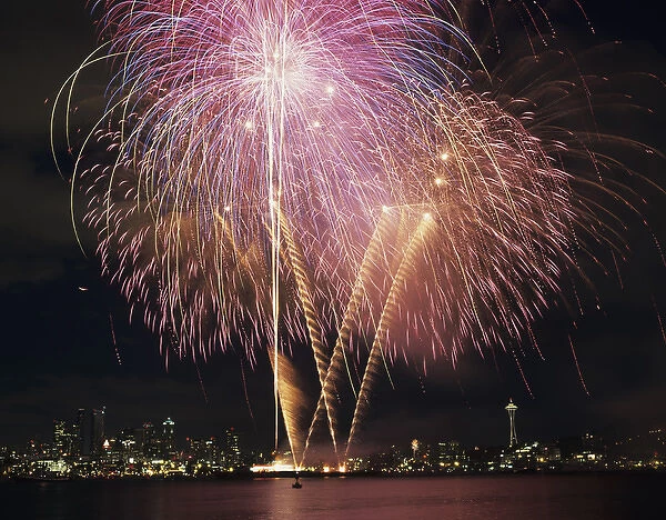 WA, Seattle, Fireworks on July 4th, at Gasworks Park; Space Needle in background