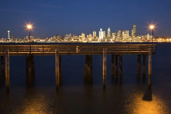WA, Seattle, Seattle skyline at night & fishing pier, view from Seacrest Marina Park
