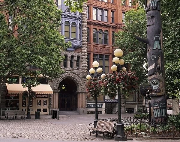WA, Seattle, Totem pole and Pioneer Building at historic Pioneer Square