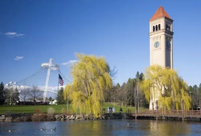 Framed Print : WA, Spokane, Riverfront Park, view across the Spokane River, the Clock Tower and the U Framed Print : WA, Spokane, Riverfront Park, view across the Spokane River, the Clock Tower and the U