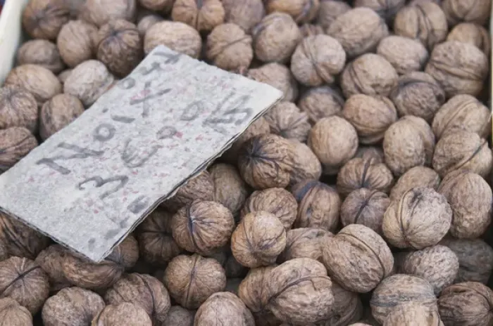 Framed Print : Walnuts for sale at a market stall at the market in Bergerac for 3 euro per kilo Framed Print : Walnuts for sale at a market stall at the market in Bergerac for 3 euro per kilo