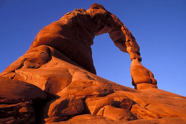 Warm evening light on Delicate Arch, Arches National Park, Utah, USA