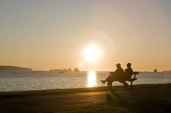 Watching the sunset at English Bay Beach in the West End of Vancouver, BC, Canada