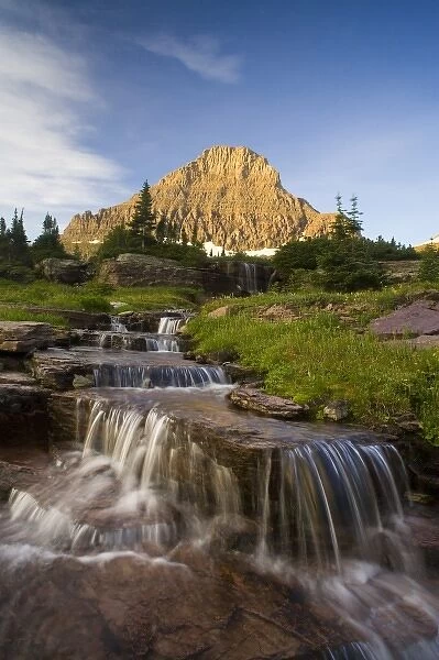 Water cascades down from Reynold Mountain at Logan Pass in Glacier National Park Montana