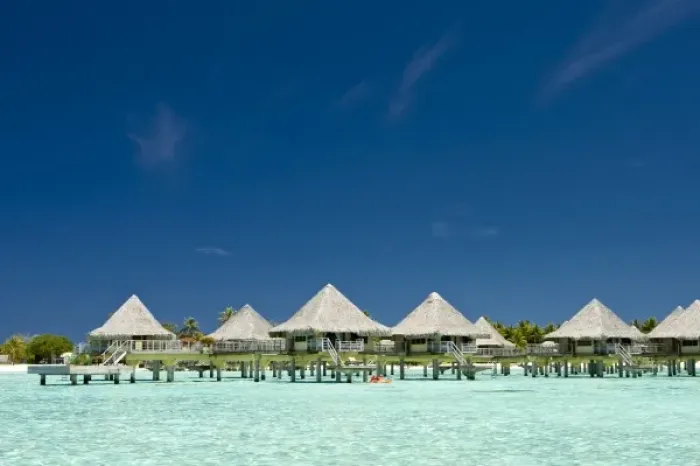 Framed Print : Over the water huts of tropical resort in beautiful Bora Bora