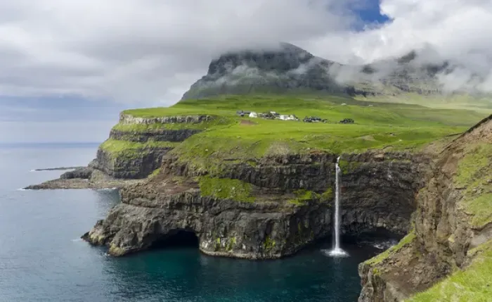 Framed Print : The waterfall near Gasadalur, one of the landmarks of Faroe Islands. The island Vagar Framed Print : The waterfall near Gasadalur, one of the landmarks of Faroe Islands. The island Vagar