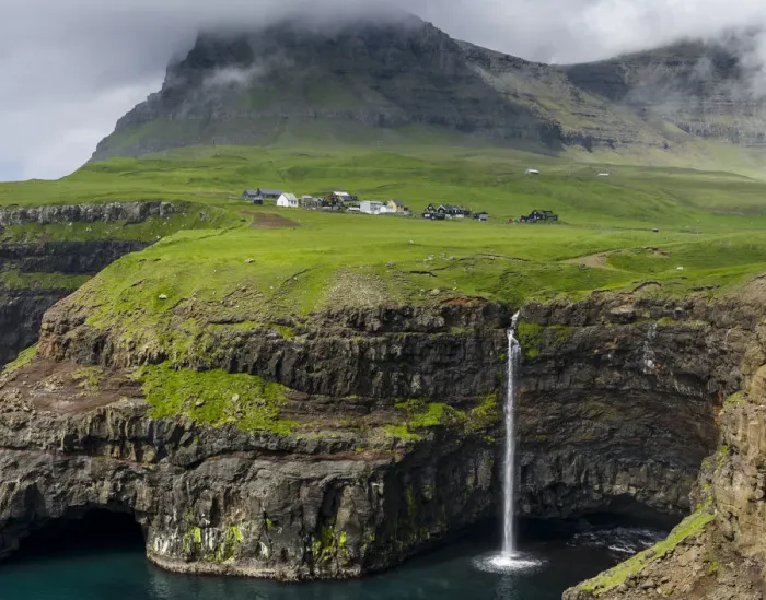 Framed Print : The waterfall near Gasadalur, one of the landmarks of Faroe Islands. The island Vagar Framed Print : The waterfall near Gasadalur, one of the landmarks of Faroe Islands. The island Vagar