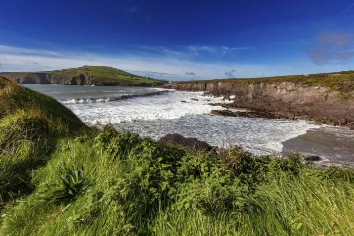 Framed Print : Waves crash into cliffs at Binn Ban Beach near Dingle, Ireland
