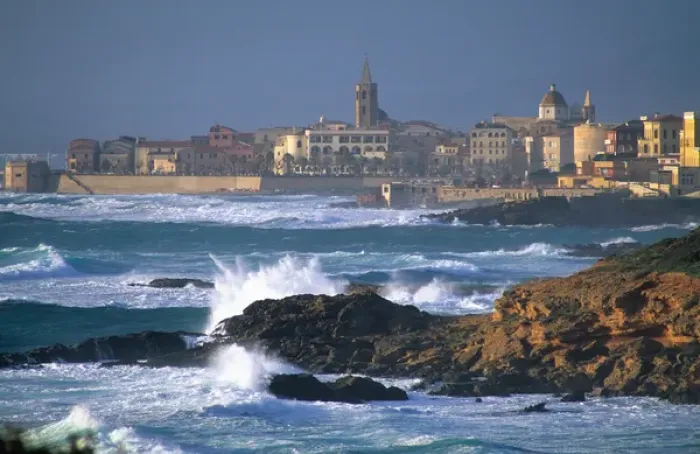 Framed Print : Waves crash on the coast at Alghero, Sardinia, Italy. roman, ancient, historical