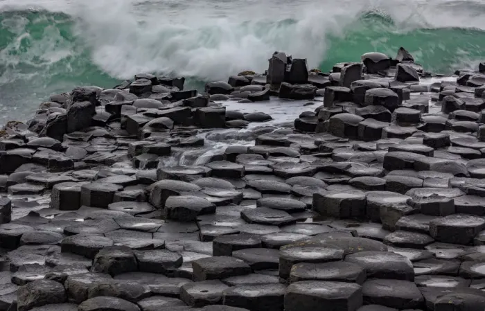 Framed Print : Waves crashing into basalt at the Giants Causeway in County Antrim, Northern