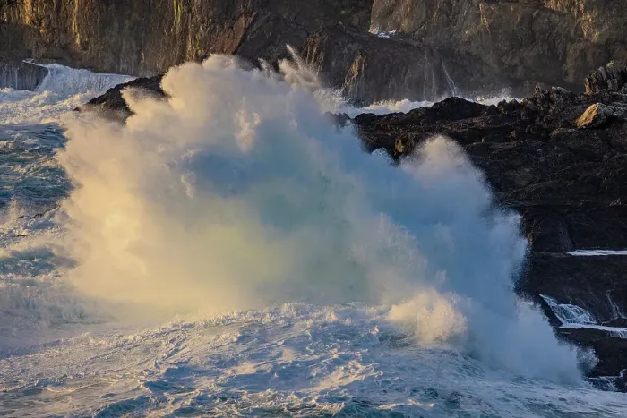 Framed Print : Waves crashing into the rocky shoreline near Dingle, Ireland