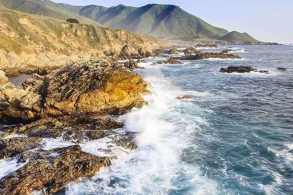 Waves create surf on rocks. Garrapata State Beach, Big Sur, California Pacific Coast. US