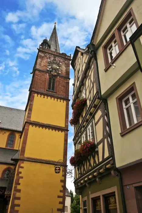Framed Print : Wertheim, Franconia, Germany, A clock tower sits next to medieval Cross Timbered Houses