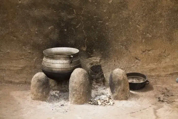 Framed Print : West Africa, Africa, Ghana, Nakpa. Pot on stove against wall of traditional mud dwelling Framed Print : West Africa, Africa, Ghana, Nakpa. Pot on stove against wall of traditional mud dwelling