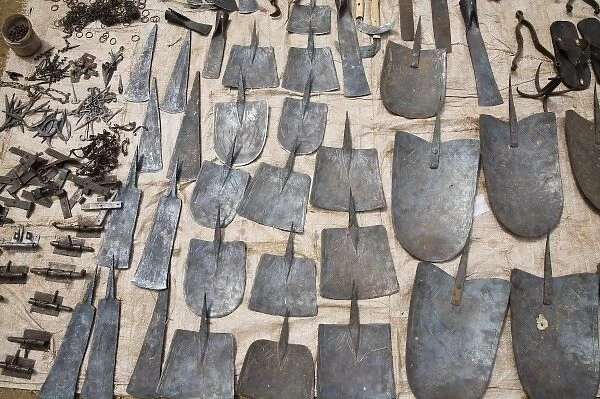 West Africa, Benin. Various metal tools for sale at open-air market