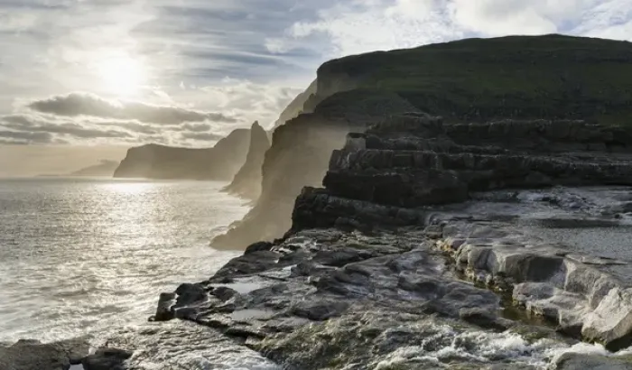 Framed Print : The west coast near Traelanipa with waterfall Bosdalafossur at sunset. The island Vagar
