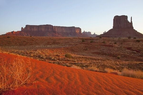 The West Mitten and Sentinel Butte at sunset in Monument Valley Navajo Tribal Park on the Arizona