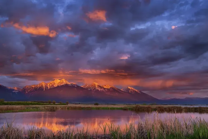 Framed Print : Wetlands pond reflects the Mission Mountains at sunset at the Ninepipe National Wildlife Refuge near Ronan, Montana, USA. (Editorial Use Only) Framed Print : Wetlands pond reflects the Mission Mountains at sunset at the Ninepipe National Wildlife Refuge near Ronan, Montana, USA. (Editorial Use Only)