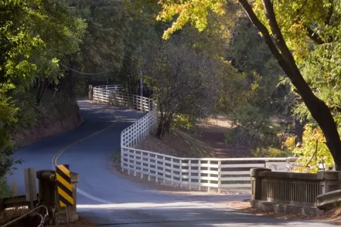Framed Print : White fence curves alongside Westside Road, Sonoma, California, USA