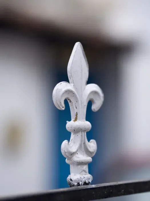 Framed Print : A white metal spike sticks up from a gate in Bangalore, Karnataka, India Framed Print : A white metal spike sticks up from a gate in Bangalore, Karnataka, India
