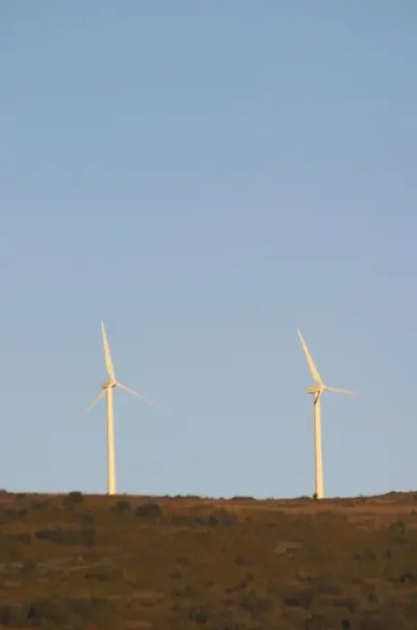 Framed Print : Wind power turbines on a mountain hill top crest against a blue sky. Limoux. Languedoc Framed Print : Wind power turbines on a mountain hill top crest against a blue sky. Limoux. Languedoc