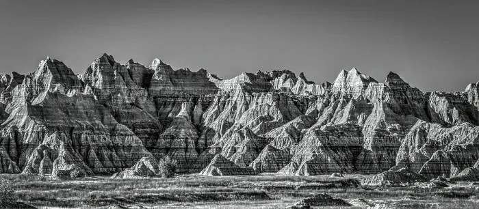 Framed Print : The wind and water eroded landscape in the Badlands National Park seem desolate but make for beautiful natural carvings. USA