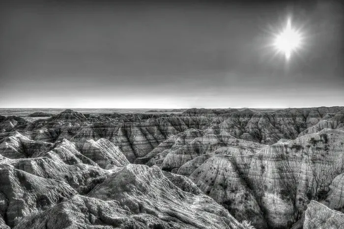 Framed Print : The wind and water eroded landscape in the Badlands National Park seem desolate but make for beautiful natural carvings. USA Framed Print : The wind and water eroded landscape in the Badlands National Park seem desolate but make for beautiful natural carvings. USA