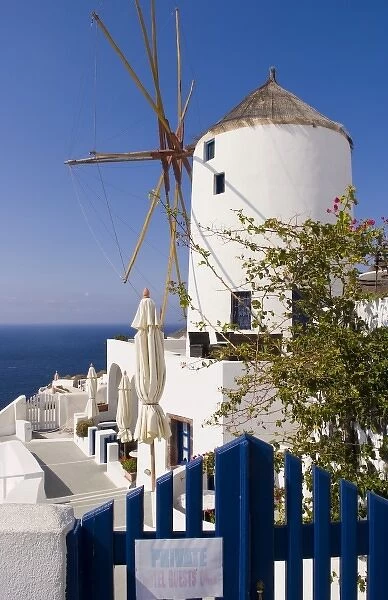 Windmill in cliff top village of Oia, Santorini, Greece