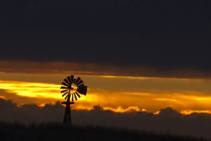 Framed Print : Windmill slihouetted against the sunset in the sandhills region of Loup County, Nebraksa