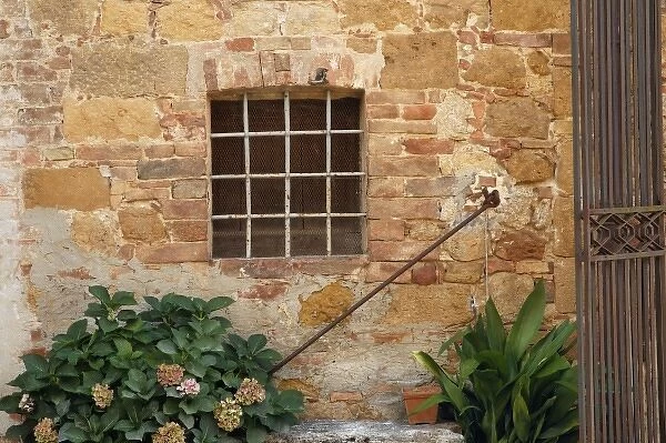 Window and ancient stone wall, Pienza, Italy, Tuscany
