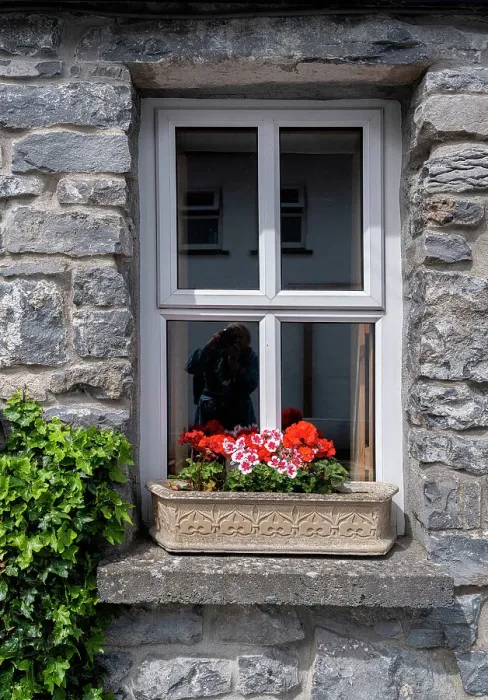 Framed Print : Window brings a smile to passersby in the historic village of Cong, County Mayo, Ireland Framed Print : Window brings a smile to passersby in the historic village of Cong, County Mayo, Ireland