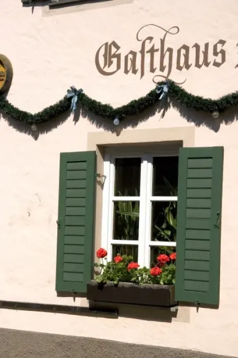Framed Print : Window with flower box on a hotel in the alpine village of Garmisch, Germany Framed Print : Window with flower box on a hotel in the alpine village of Garmisch, Germany