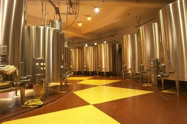 The winery, stainless steel fermentation tanks in a round building - Chateau Baron