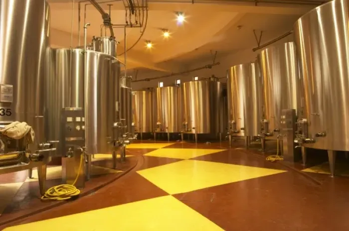 Framed Print : The winery, stainless steel fermentation tanks in a round building - Chateau Baron