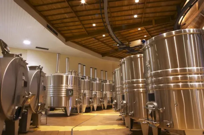 Framed Print : The winery with wooden and stainless steel fermentation vats. It is built in a circular design Framed Print : The winery with wooden and stainless steel fermentation vats. It is built in a circular design