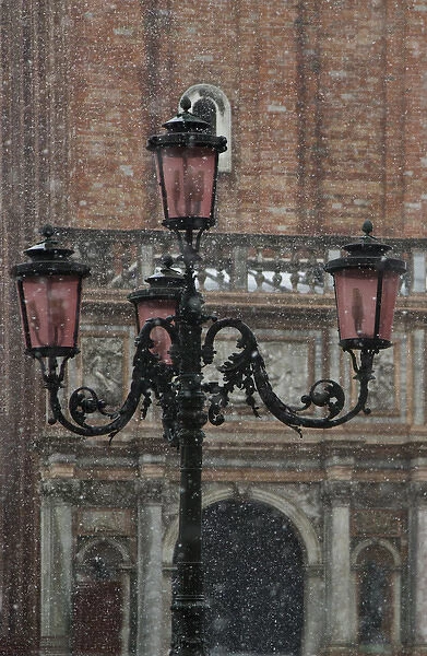 Winter snows and Venetian Lamp post, Venice Italy