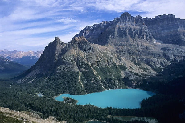 Wiwaxy Peaks (left of center) and Mount Huber rise above the waters of Lake O Hara