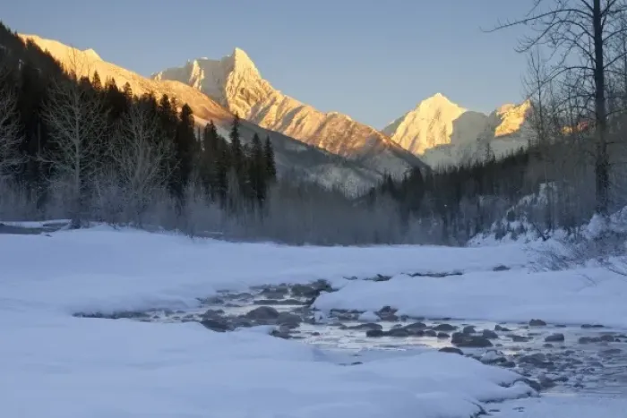 Framed Print : Wolftail Mountain and Mt Doody loom over a channel of the Middle Fork of the Flathead