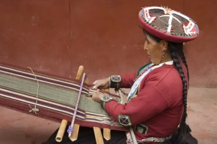 Framed Print : Woman in traditional dress and hat weaving using a backstrap loom to weave, Chinchero Framed Print : Woman in traditional dress and hat weaving using a backstrap loom to weave, Chinchero