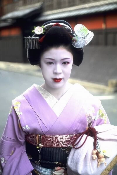 Wonderful colorful close-up of Geisha Girl in streets of Kyoto Japan (MR)