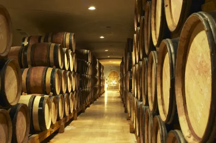 Framed Print : Wooden barrels with aging wine in the cellar of Guigal in Ampuis. Domaine E Guigal Framed Print : Wooden barrels with aging wine in the cellar of Guigal in Ampuis. Domaine E Guigal