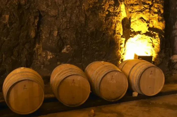 Framed Print : Wooden barrels for fermenting and aging white wine. Chateau Romanin, Saint Remy de Provence