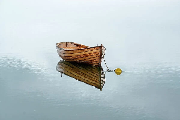Wooden boat at anchorage is the epitome of simplicity. Westport, County Mayo, Ireland