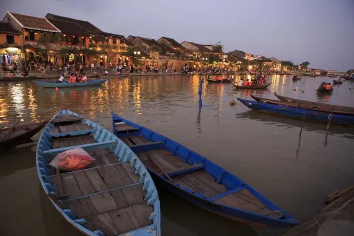 Framed Print : Wooden boats moored on the Thu Bon River opposite Bach Dang Street in the old town of Hoi An Framed Print : Wooden boats moored on the Thu Bon River opposite Bach Dang Street in the old town of Hoi An