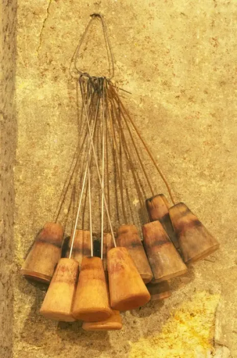Framed Print : wooden bung plugs with an iron wire hook that are used for cleaning the barrles with Framed Print : wooden bung plugs with an iron wire hook that are used for cleaning the barrles with