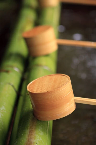Wooden ladles are placed at the entrance to Kasuga-Taisha Shrine in Nara, Japan for