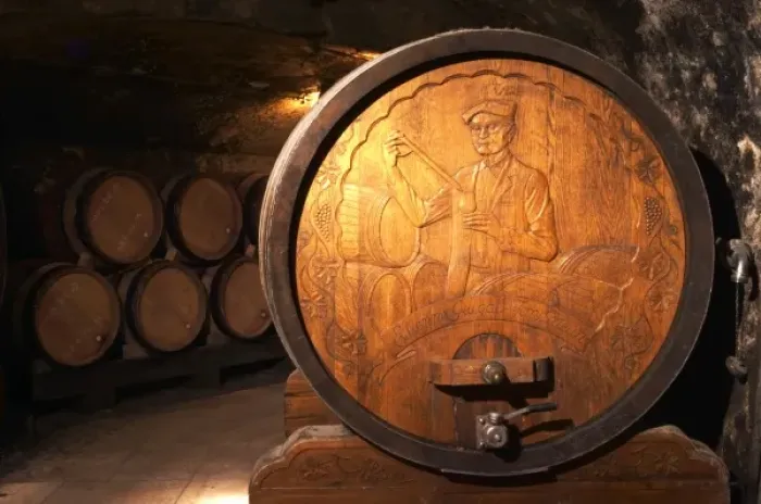 Framed Print : Wooden storage vat with aging wine of Guigal in Ampuis. The end of the vat is carved Framed Print : Wooden storage vat with aging wine of Guigal in Ampuis. The end of the vat is carved